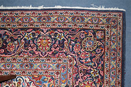 An Iranian Kashan carpet, 12ft 6in by 8ft 11in.